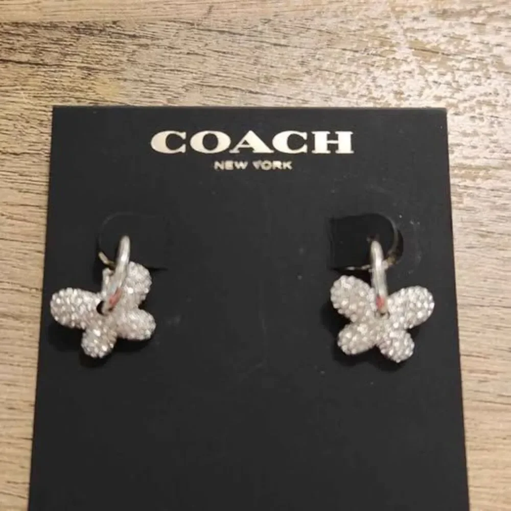 Coach Butterfly Silvertone Hoops NEW - Picture 1 of 6